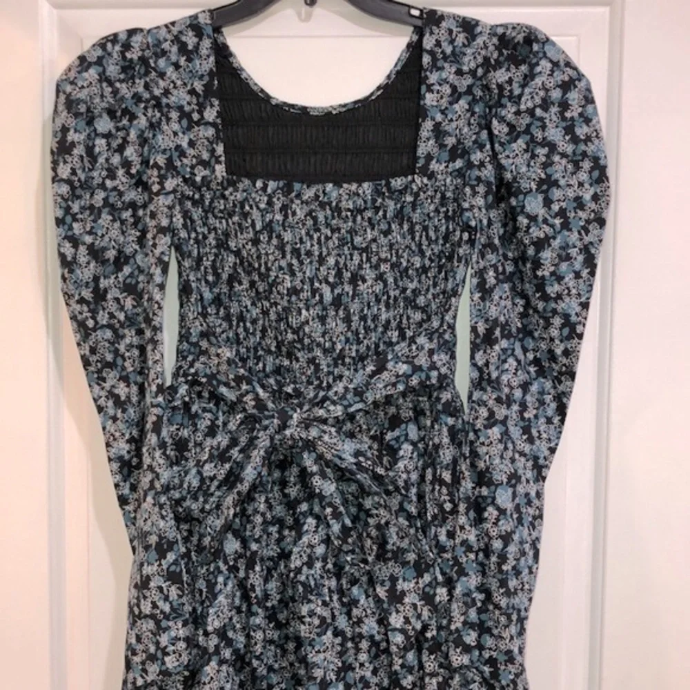 The Polly dress ditzy floral smocked boho dress size medium new with tags